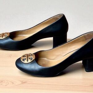 The Perfect leather black Tory Burch Black Heels with Gold Tory Emblem. So great